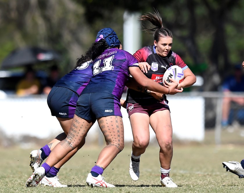 Queensland Sapphires and Victoria in action. 