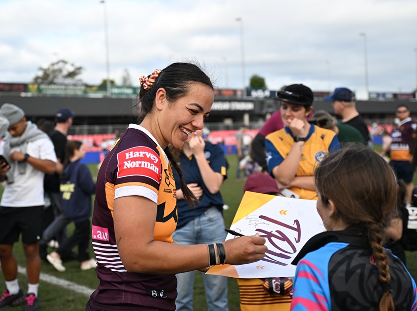 Stacey Waaka with a young fan following her NRLW debut.