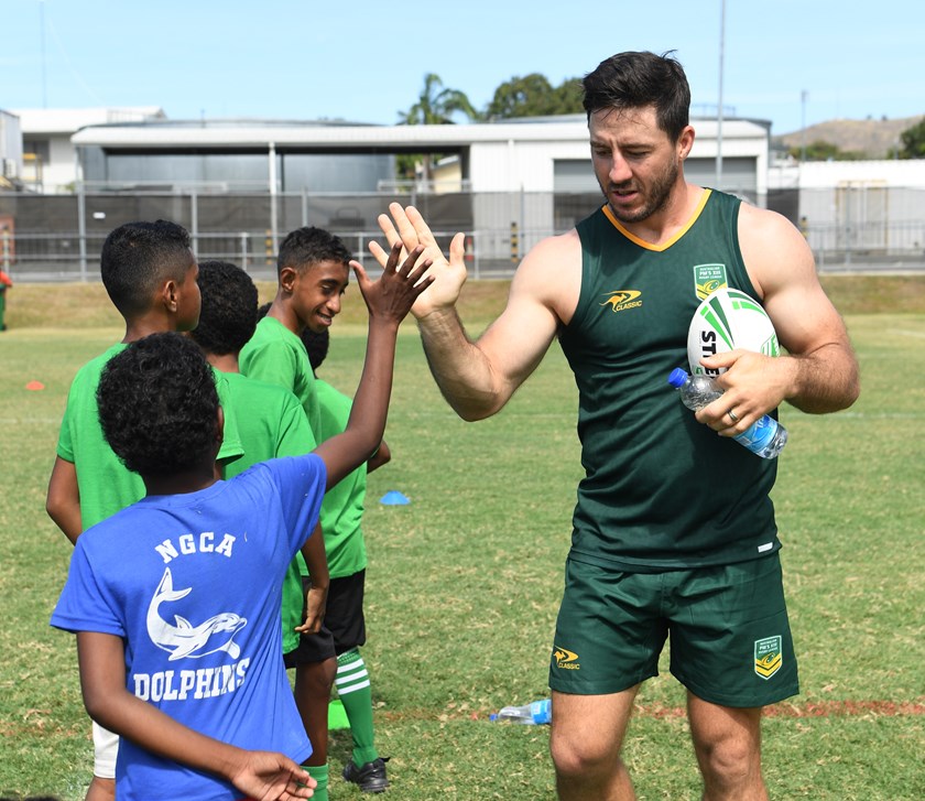 Ben Hunt takes part in a junior clinic in PNG.