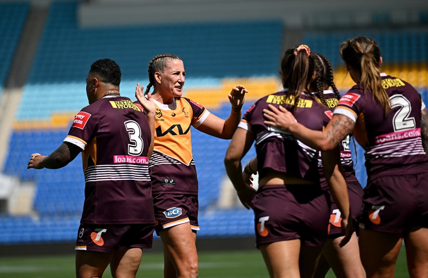 Broncos captain Ali Brigginshaw celebrates with her team.