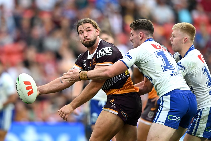 Pat Carrigan attempts an offload against the Bulldogs.