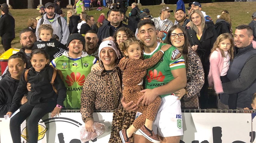 Raiders forward Emre Guler with family.