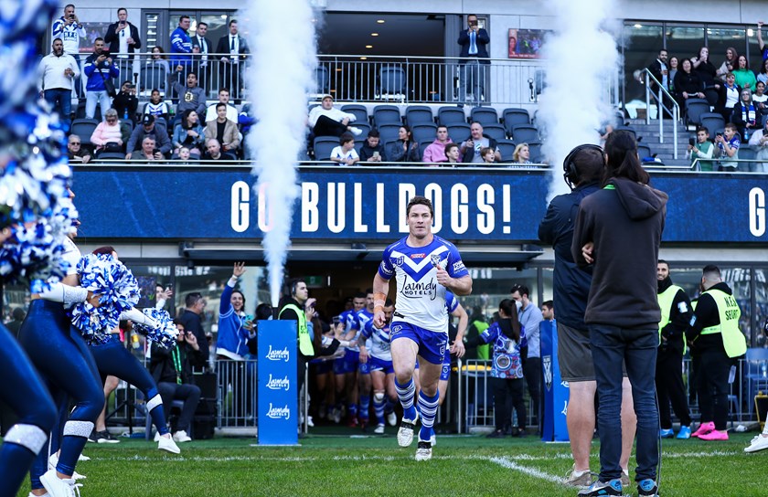 Former Bulldogs captain Josh Jackson leads out the team.