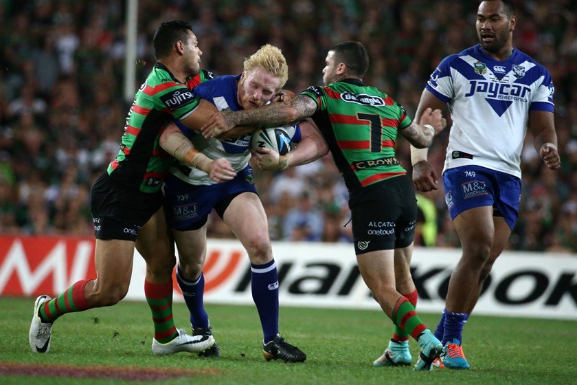 Adam Reynolds and current Broncos assistant coach Ben Te'o during the 2014 grand final win against the Bulldogs under Michael Maguire.