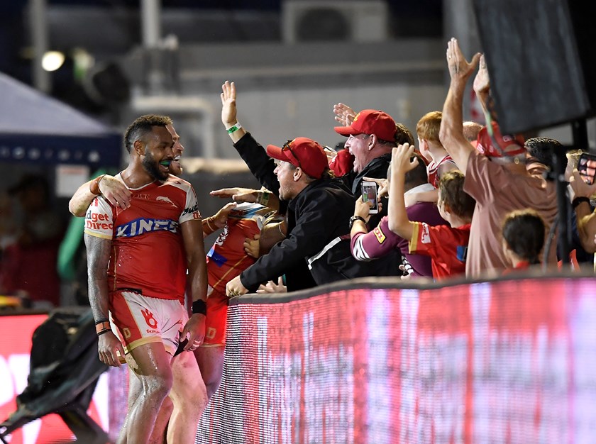 Hamiso Tabuai-Fidow celebrates with Dolphins fans. 