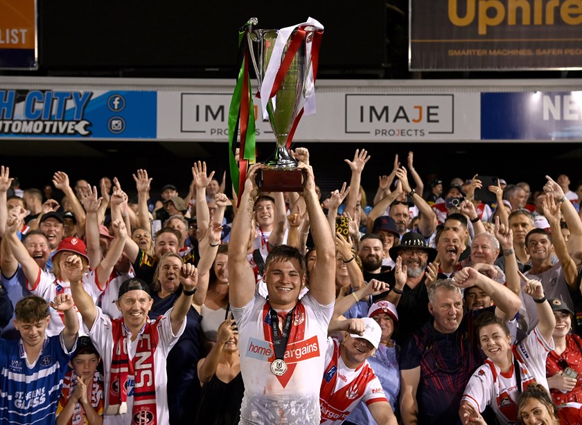 Welsby celebrates with St Helens fans after the English team's WCC win