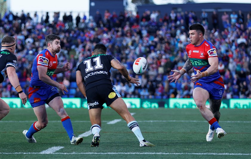 Adam Clune puts Bradman Best through a hole against the Sharks.