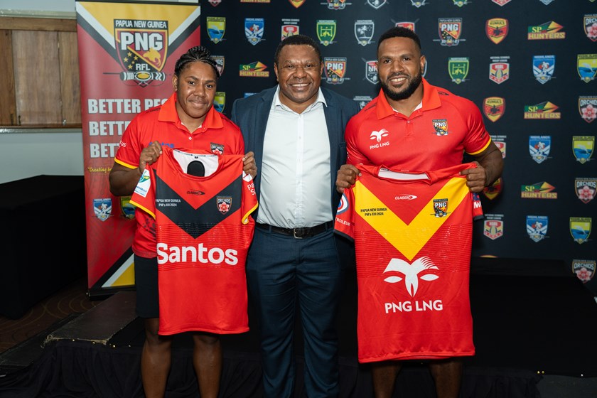 Belinda Gwasamun with husband Brandon Nima and PNGRFL CEO Stanley Hondina before they both played in the Prime Minister's XIII clashes in Port Moresby.