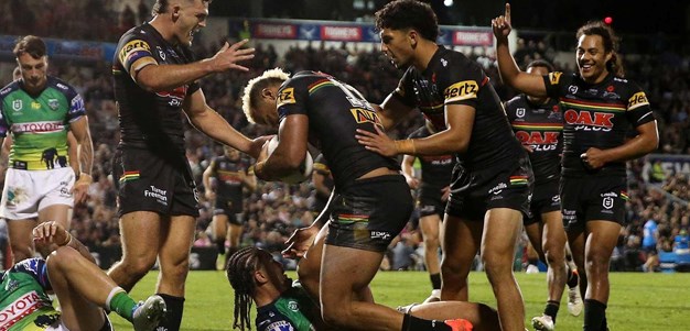 Kikau twists and turns to put the footy down