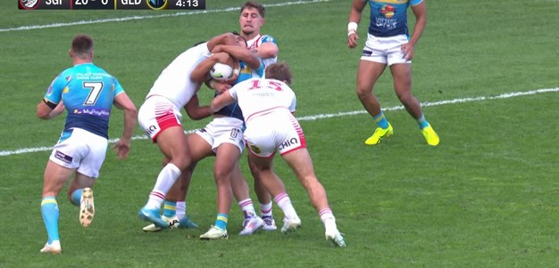 Kini gets carried back by the Dragons defence