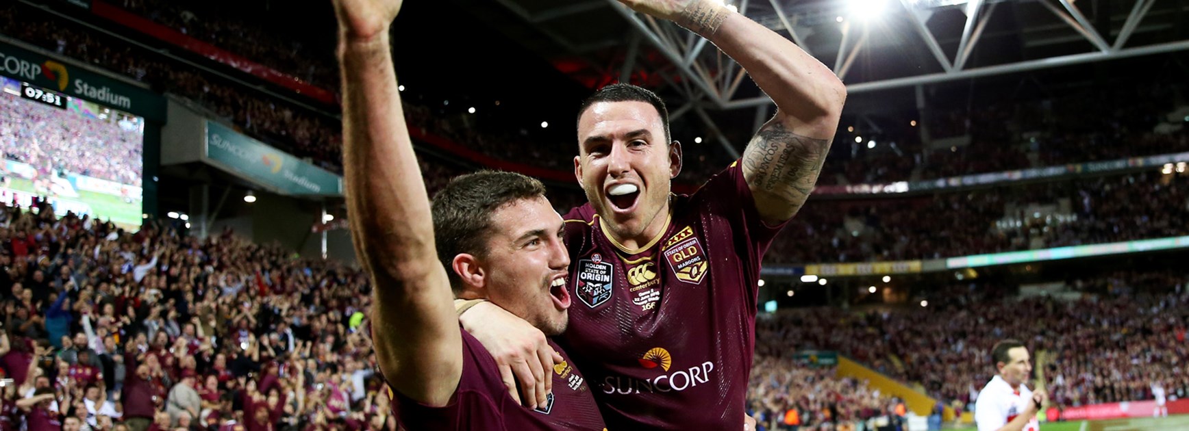 Darius Boyd and Corey Oates celebrate Oates' late try in State of Origin II.