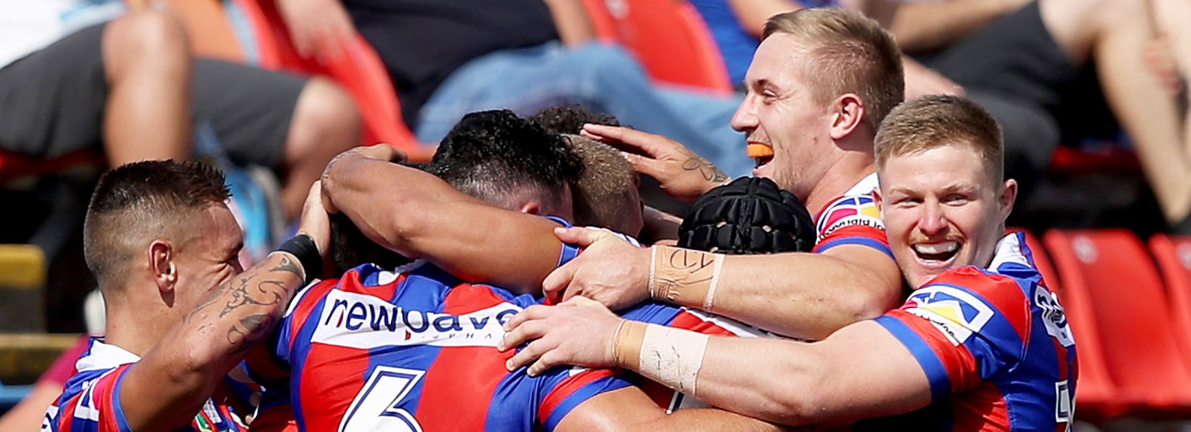 The Knights celebrate a try during their Round 2 clash with the Titans.