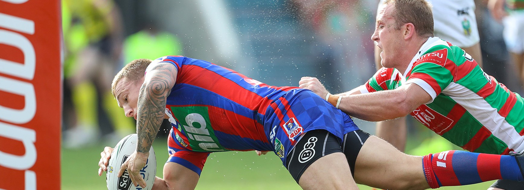 Trent Hodkinson scores against a 12-man Rabbitohs side.