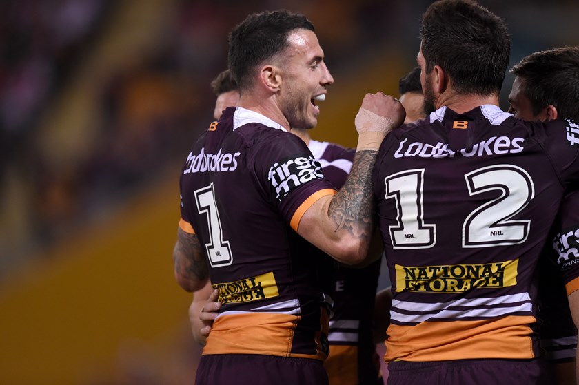 Brisbane captian Darius Boyd celebrates a Broncos' try.