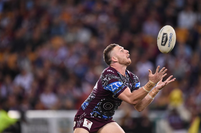 Manly utility player Jackson Hastings prepares to field a kick.