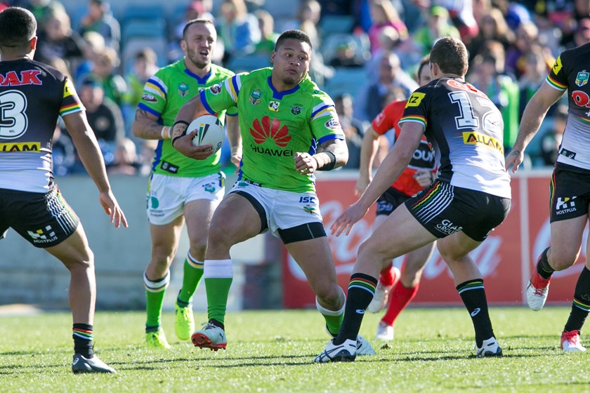 Canberra Raiders centre Joey Leilua takes on the Panthers defence.