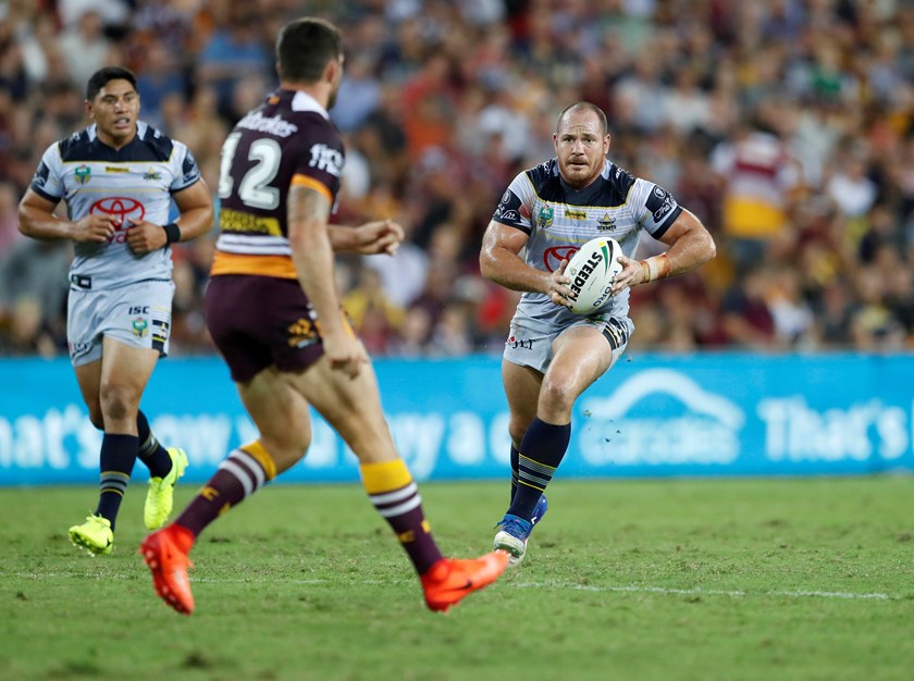 Matt Scott carts the ball ahead against the Broncos.