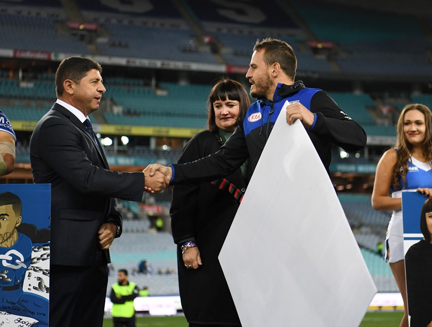 Canterbury chairman Ray Dib with CEO Ralene Castle and Josh Reynolds at a farewell presentation for the outgoing Bulldogs five-eighth last season.