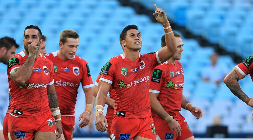 Dragons centre Tim Lafai celebrates a try.