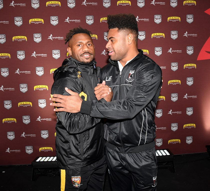 Papua New Guinea's James Segeyaro and Fiji's Kevin Naiqama.