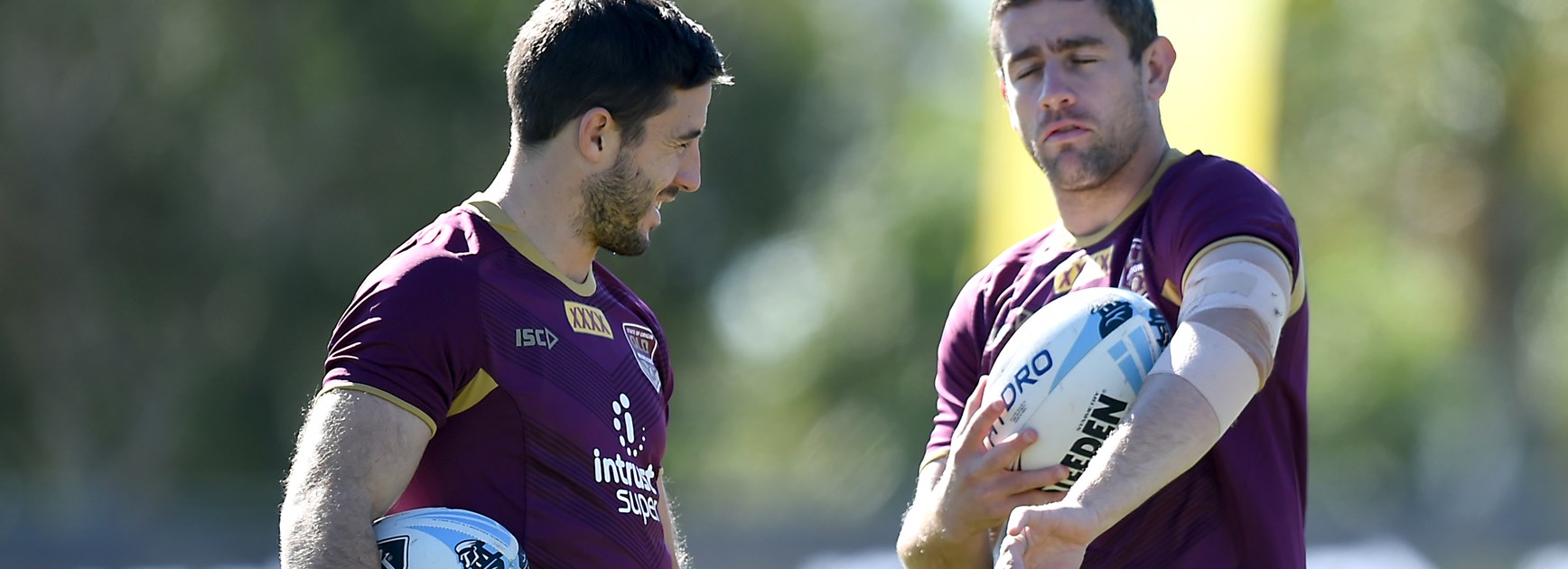 Queensland Maroons Ben Hunt and Andrew McCullough.