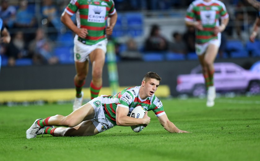 Rabbitohs utility Adam Doueihi scores against the Titans.