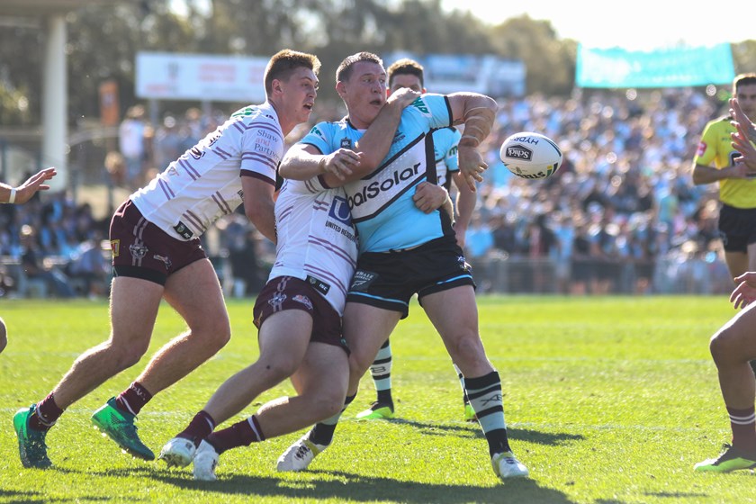 Cronulla captain Paul Gallen offloads against Manly.