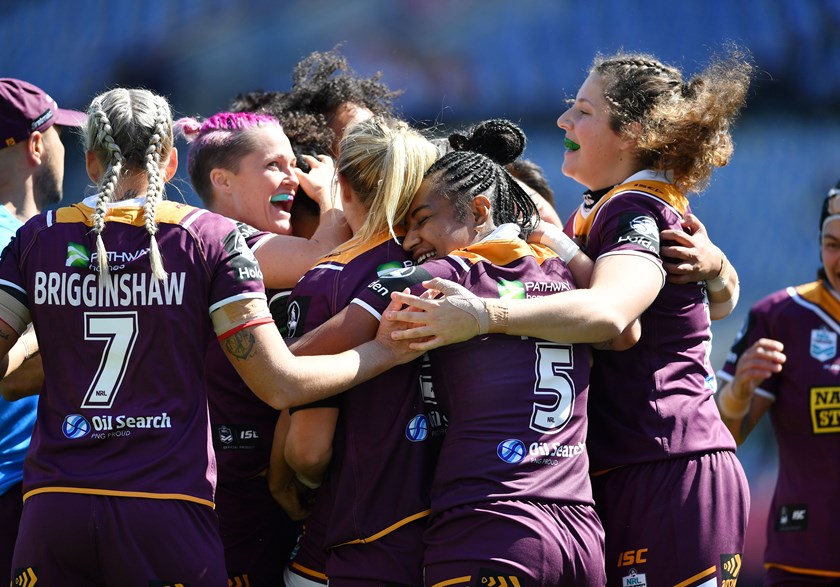 Brisbane celebrate a try during the NRLW grand final.