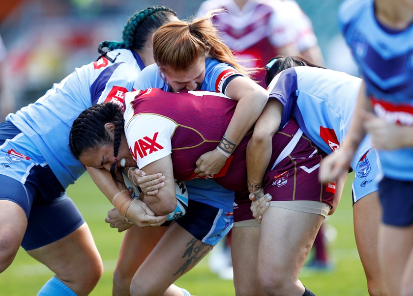 Tazmin Gray taking on the NSW defence in 2017.