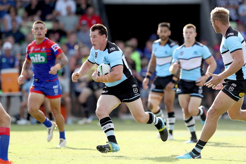 Paul Gallen takes a charge for the Sharks.