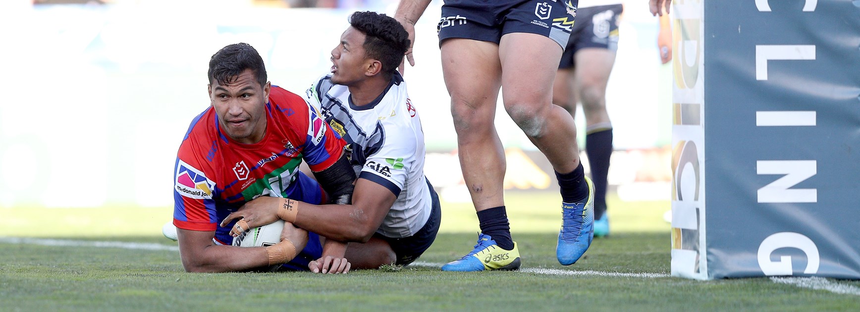 Jacob Saifiti crosses the line against the Cowboys.