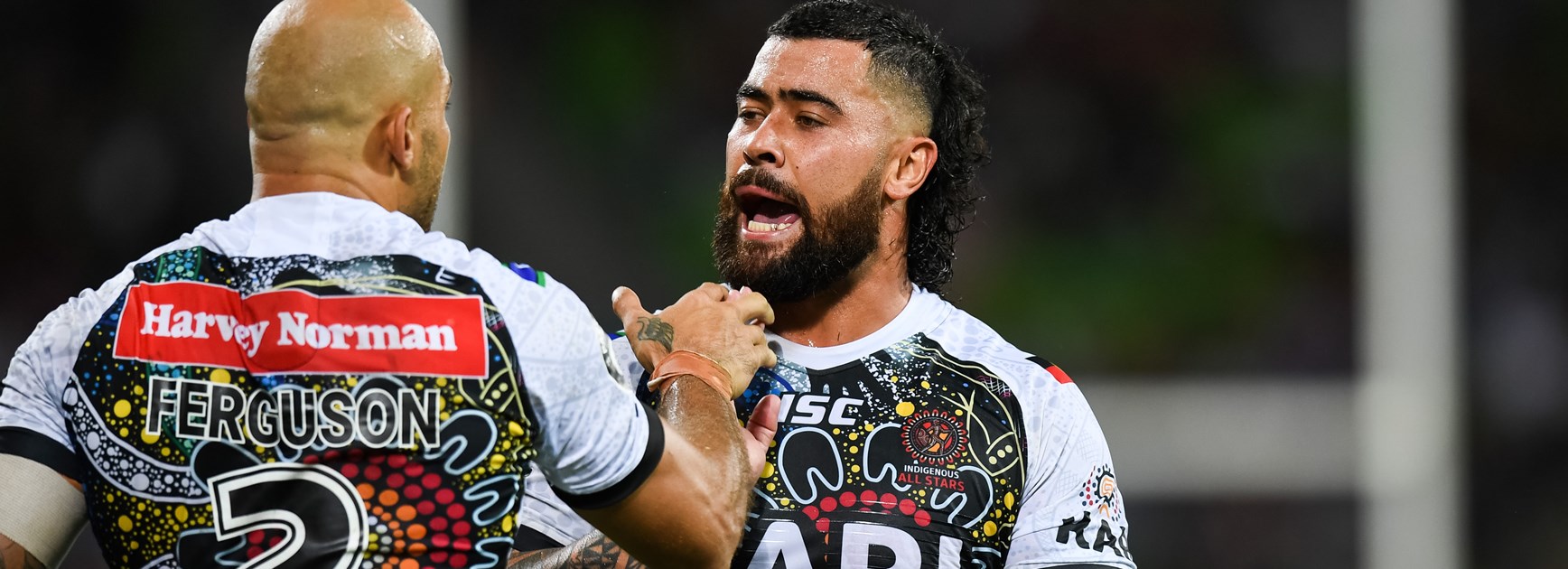 Andrew Fifita and Blake Ferguson celebrate for the Indigenous All Stars.