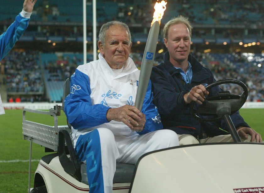 Jack Gibson with the Olympic torch in 2004.