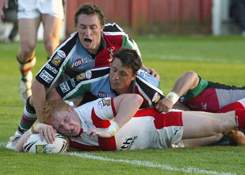 Graham scores a try for St Helens.