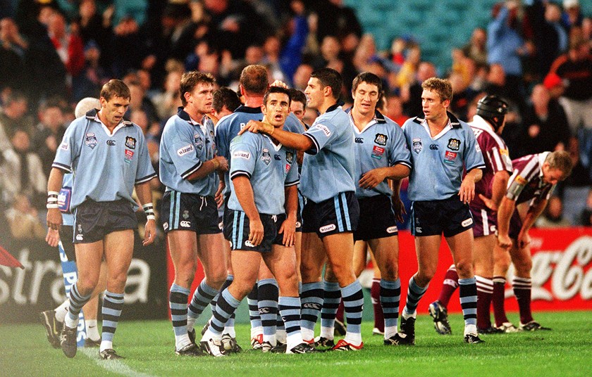 The Blues celebrate a try.