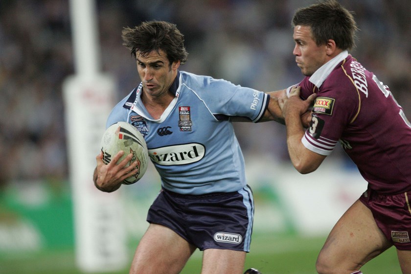 Andrew Johns tries to get around Shaun Berrigan.