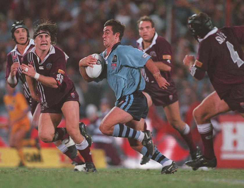 Andrew Johns makes a break for the Blues in 1998.