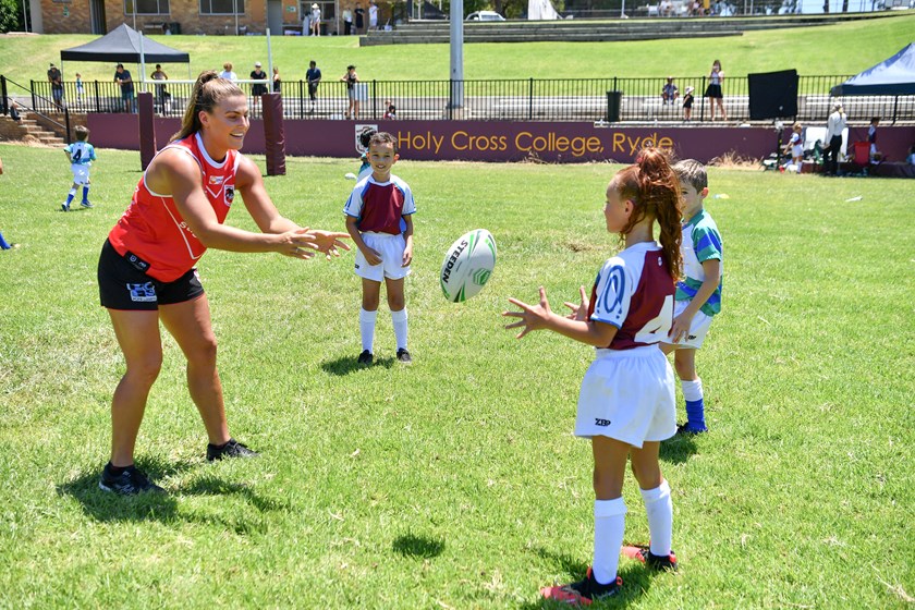 NRLW star Jess Sergis with junior league players.