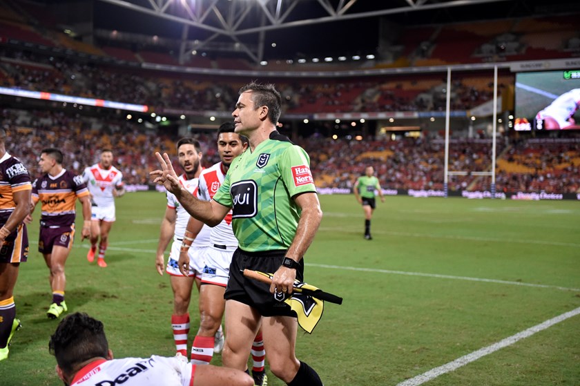 Chris Butler steps in to help the referee with an on-field decision.