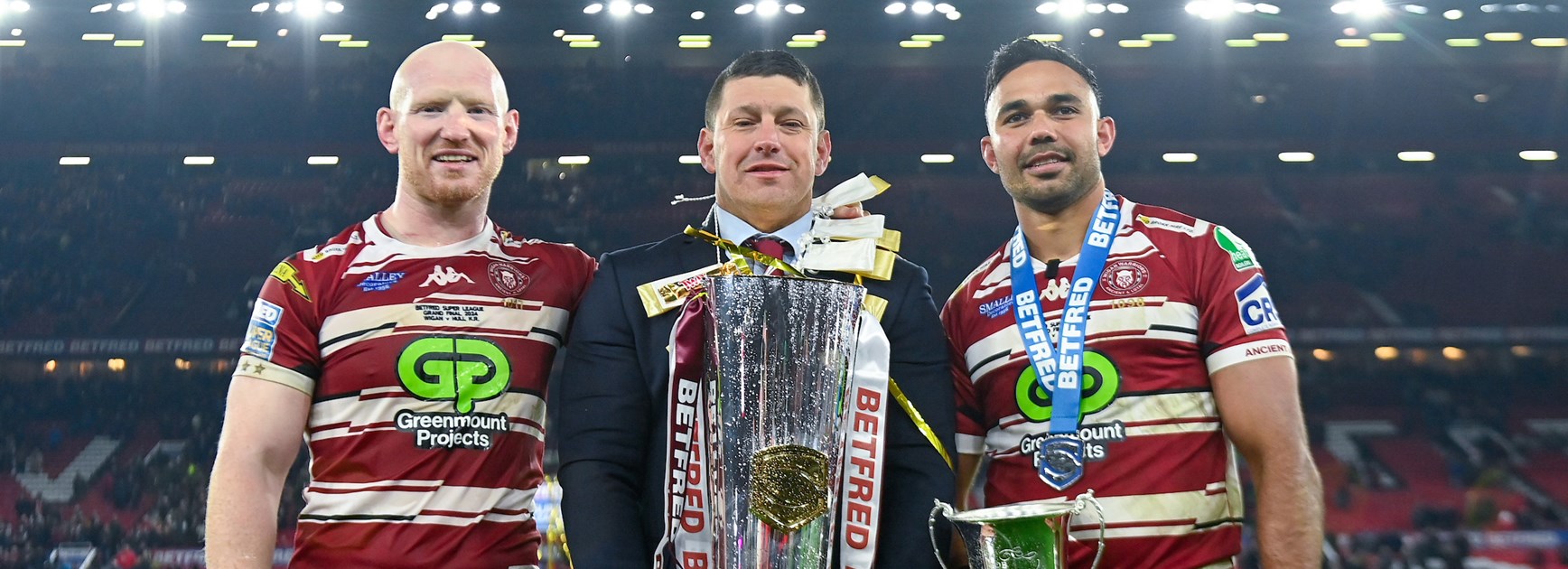 Wigan coach Matt Peet, captain Liam Farrell and Rob Burrow Award winner Bevan French after the grand final.