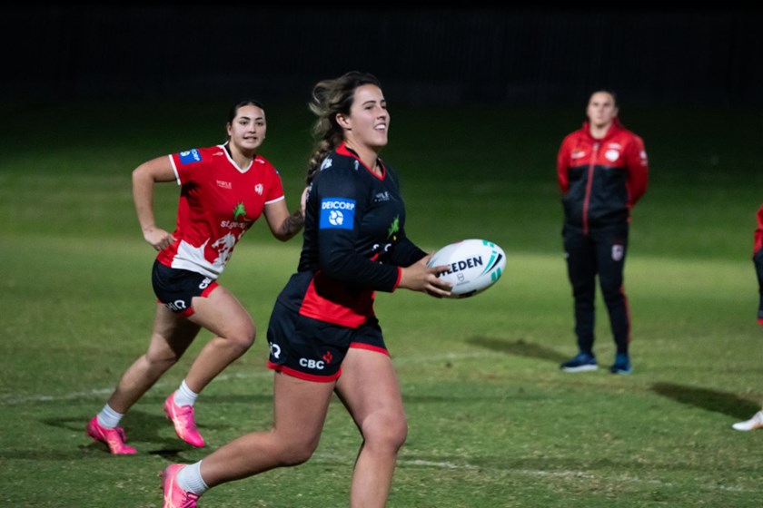 Bronte Wilson putting in the hard yards at Dragons training with another of the club's rising stars Trinity Tauanea.