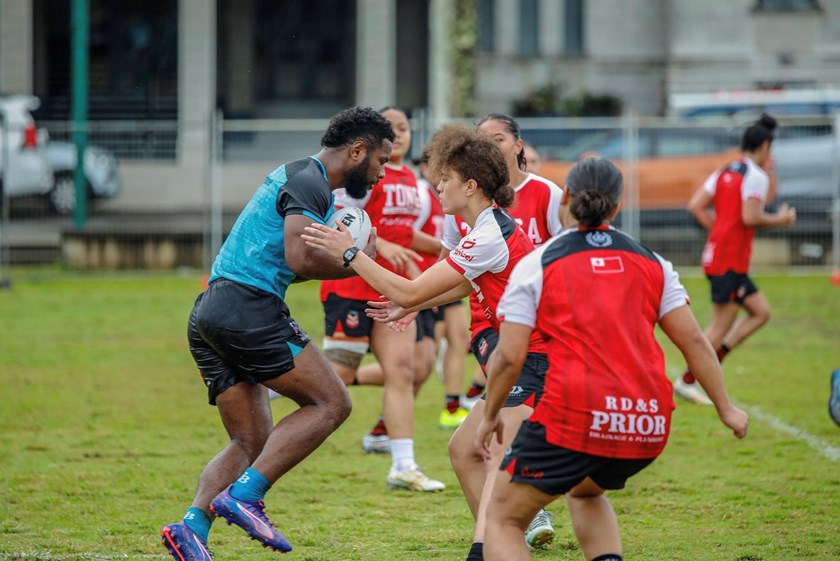 Bati winger Semi Valemei is tackled by Tongan playmaker Cassey Tohi-Hiku during an opposed session in Suva.
